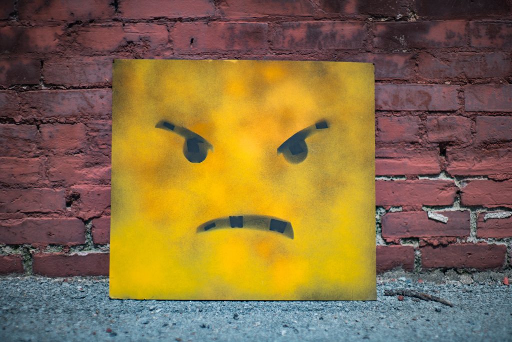 Unhappy face photo by Andre Hunter on Unsplash